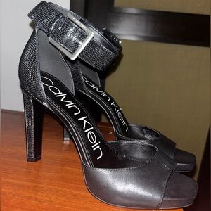 Calvin Klein black leather snake type print